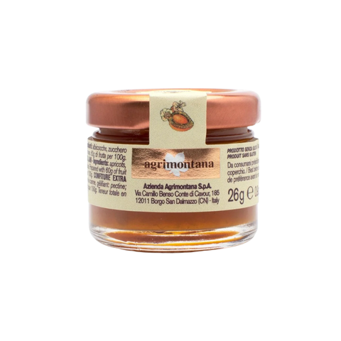 Small glass jar with a copper lid labeled 'Agrimontana' on a white background