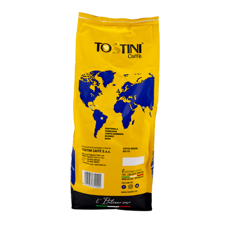 Yellow coffee bag with world map design and Tostini Caffè branding on a white background
