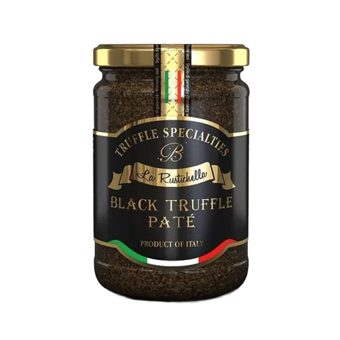 Jar of black truffle páté with gold and black label on a white background