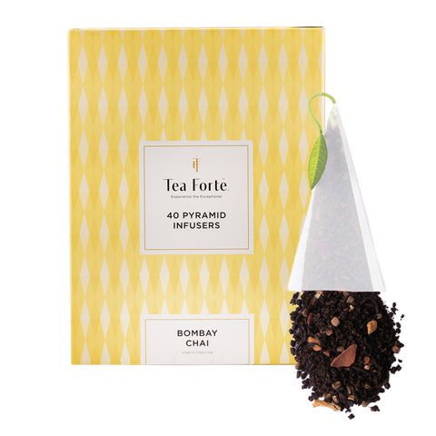 Tea Forte Bombay Chai pyramid infusers packaging with a small amount of tea leaves displayed.