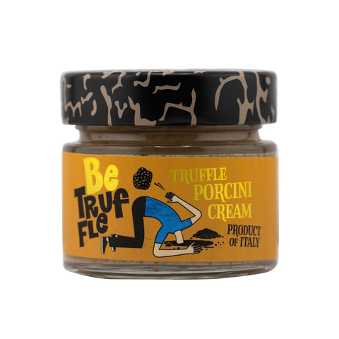 Jar of truffle porcini cream with a decorative lid on a white background