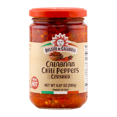 Jar of Delizie di Calabria Calabrian Chili Peppers Crushed on a white background