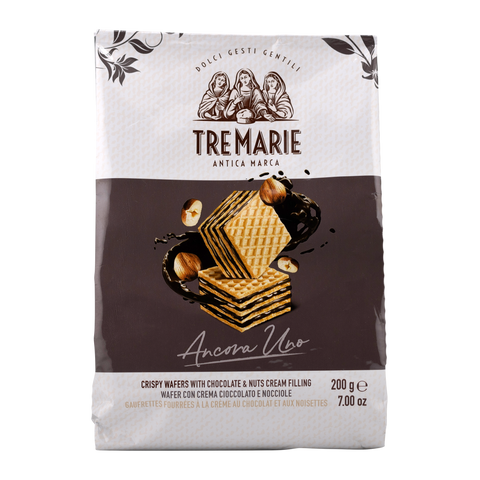 Packaging of Tremarie wafers with chocolate and nuts on a white background