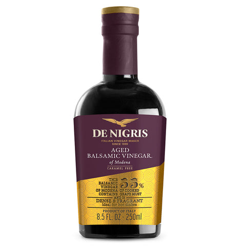 Bottle of De Nigris Aged Balsamic Vinegar on a white background