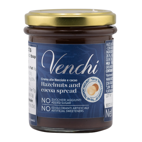 Jar of Venchi hazelnuts and cocoa spread with a gold lid on a white background