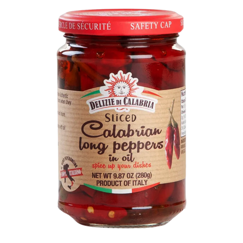 Jar of Delizie di Calabria sliced Calabrian long peppers in oil on a white background