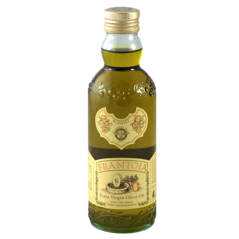Bottle of Frantoia extra virgin olive oil on a white background