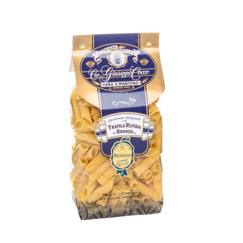 Bag of pasta with a blue and gold label on a white background