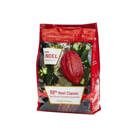 Red packaging of Noel chocolate with a cocoa bean on a white background