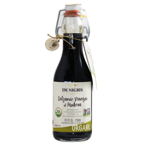 Bottle of De Nigris Balsamic Vinegar of Modena on a white background