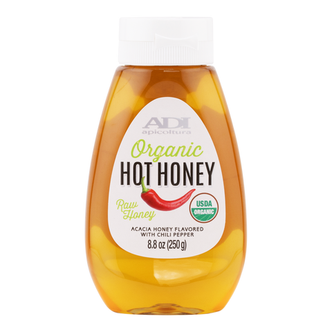 Bottle of ADI Organic Hot Honey on a white background