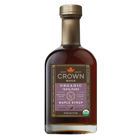 Bottle of Crown Maple Organic 100% Pure Maple Syrup on a white background