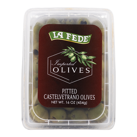 Container of pitted Castelvetrano olives with La Fede label on a white background