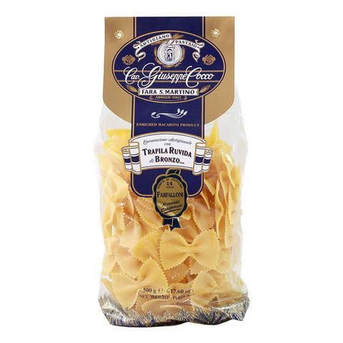 Bag of farfalle pasta with a brand label on a white background