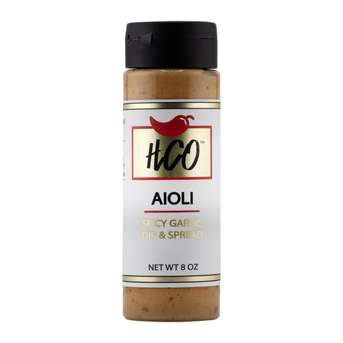 Bottle of Spicy Garlic Aioli on a white background