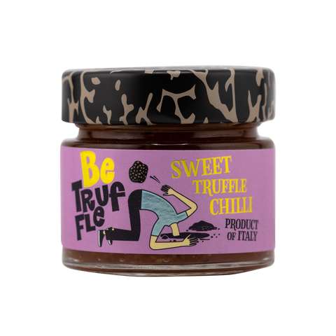 Jar of sweet truffle chili with a colorful label on a white background