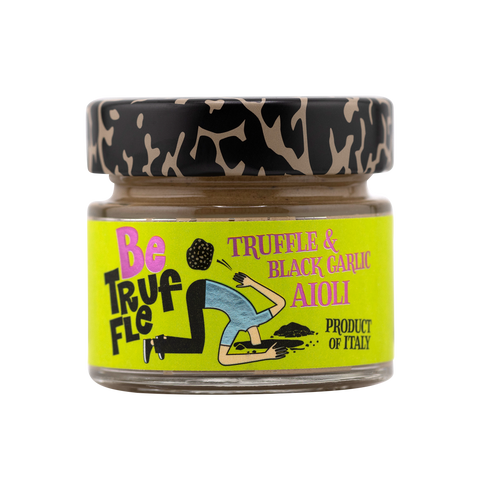 Jar of truffle and black garlic aioli with a colorful label on a white background